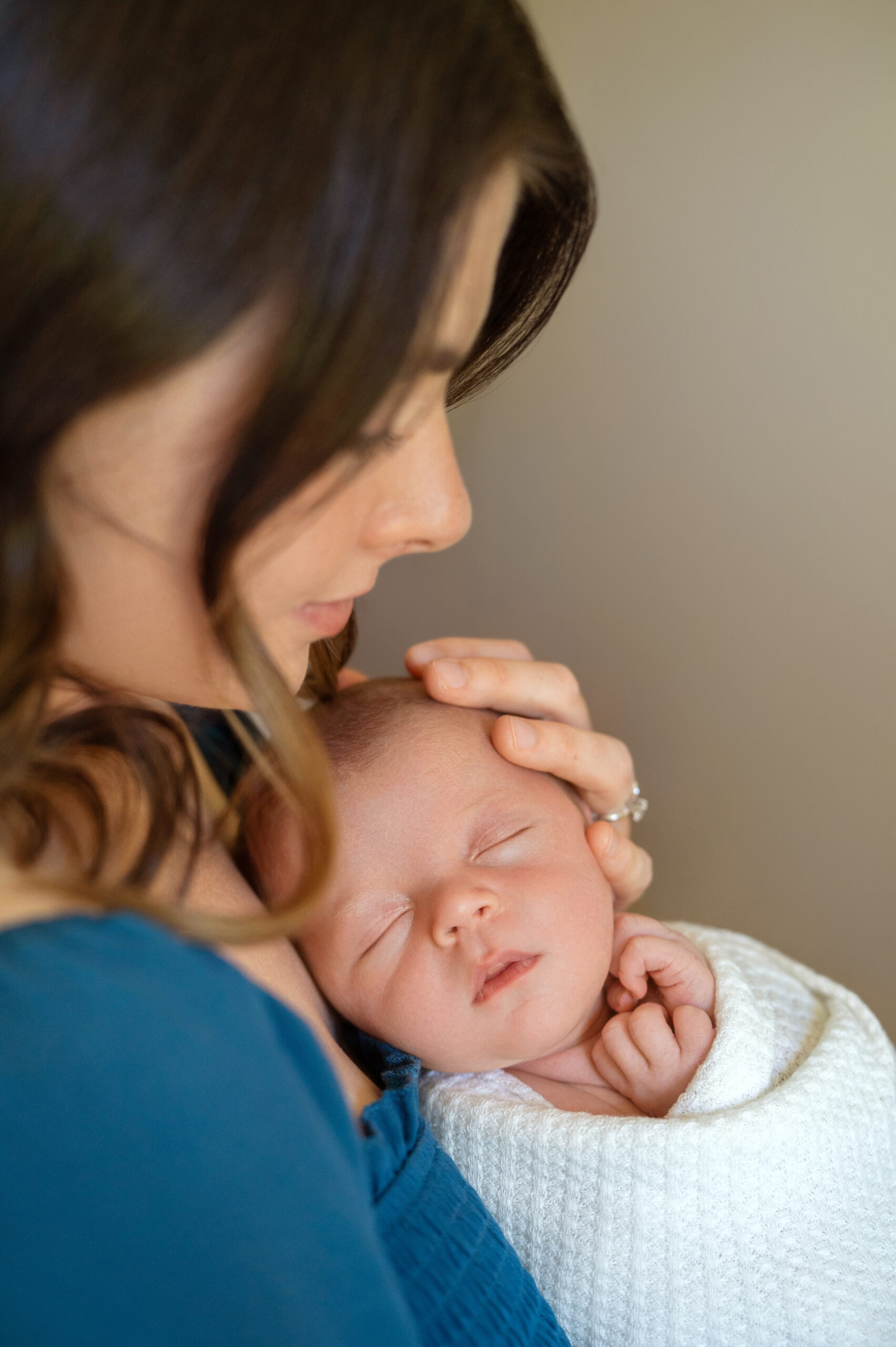 Mom holding baby in southeast Michigan photoshoot